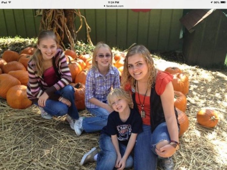 Grandkids in pumpkin patch