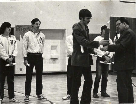 Championship Cross Country Team accepts trophy