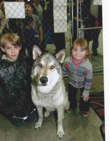 Travis and Isabella with  wolf