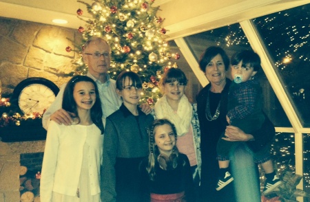 Kathy and I with grandchildren Xmas 2015