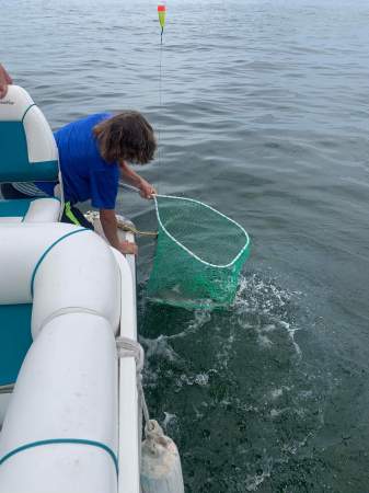 Colton netting a 3' shark! 