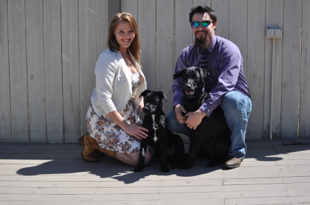 Matt with his girlfriend and grand puppies