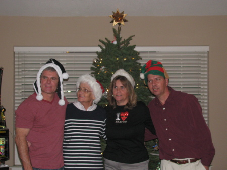 My brother, Ricky, our Mom, me, and my hubby Rick