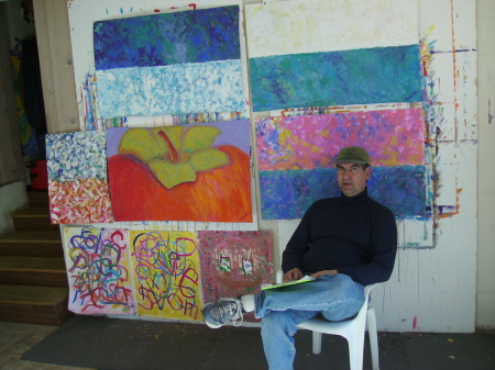 Kenneth amidst Colorful Works