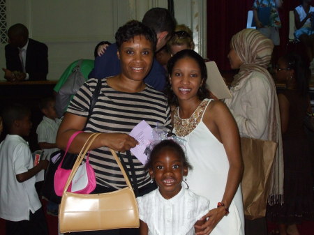 Darlene Harley in the stripped shirt with daughter and grandaughter