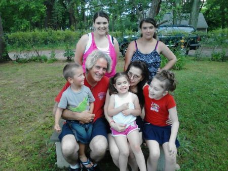 Jack and I with 5 of our 8 grand children June 2011