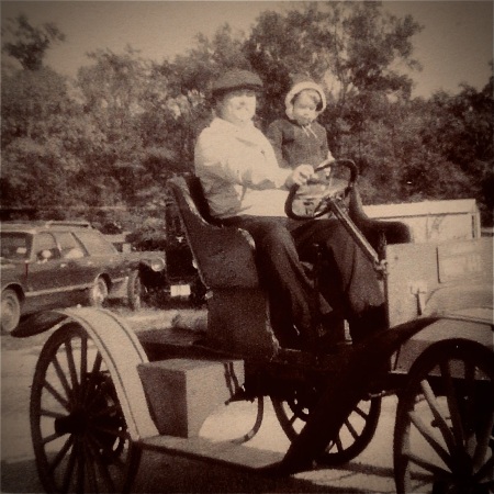 Marty with Daddy in our 1907 Simplo automobile