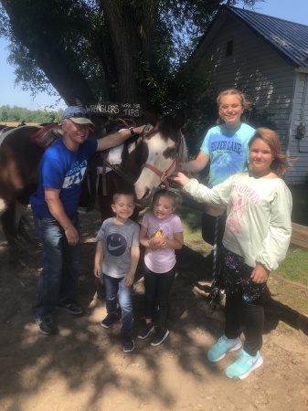 Trail riding with grandkids and great grandkid