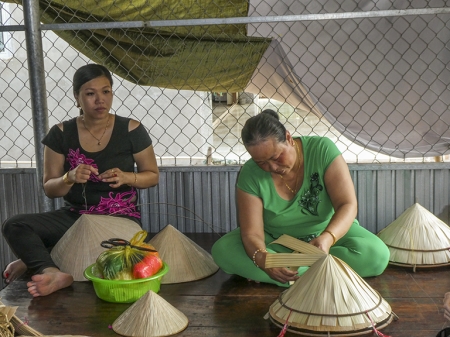 Two Vietnamese Women Making Hats 