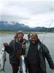 This is me and my baby Brother fishing in ALASKA and yes those are " SALMONS" we are holding mine was about 25 to 30 lbs in this shot and my bother's were 35 to 45lbs " CAN YOU SAY SALMON STEAKS" 