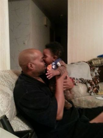 son kissing dad