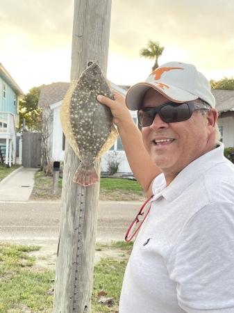 Gig 'em!  Flounder fishing in the front yard.