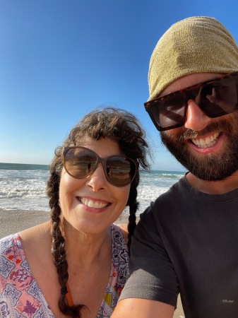 My youngest son taking his mum to the beach