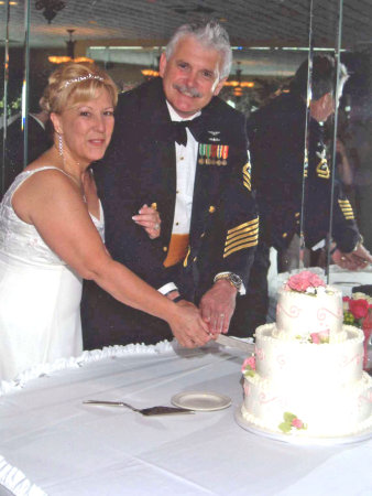 Cutting our wedding cake in 2006