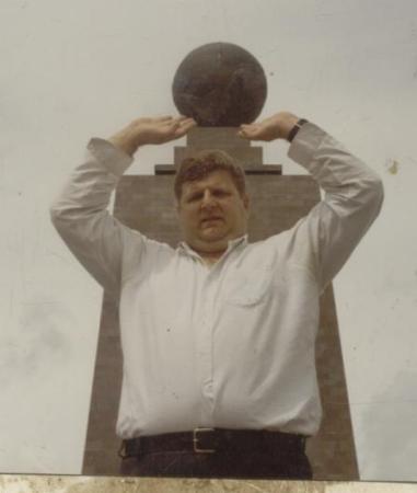 Quito, Equidor - Equator Monument - holding up