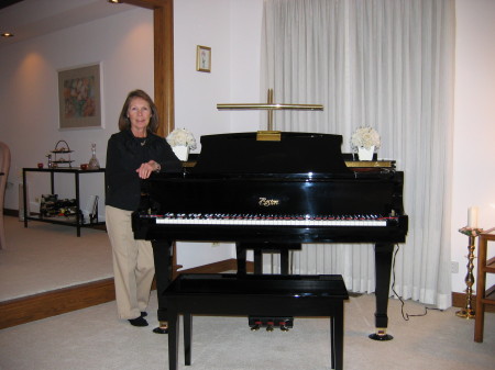 Sueann and her dream parlor grand piano