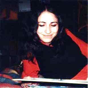 Mary Elaine looking at my photos 1976