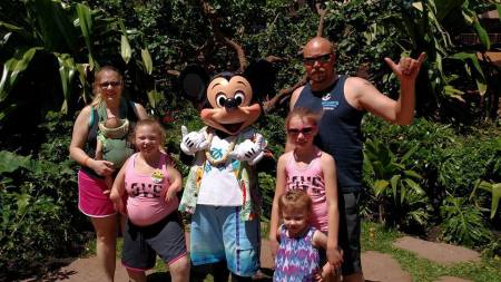 Ben, Wendy, the girls and Mickey in Hawaii.