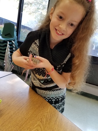 Ava 4th grade with Lizzy the Gecko