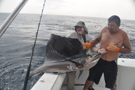 Fishing in a rainstorm, Los Suenos, Costa Rica