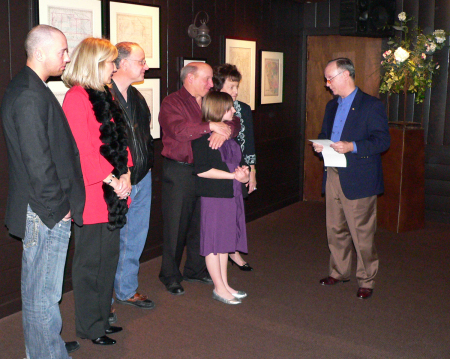 John in Reno NV presenting an 80 Year Dealer Plaque to the Besso Family