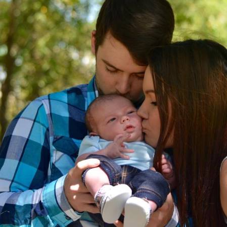 A few kisses from mommy & daddy.