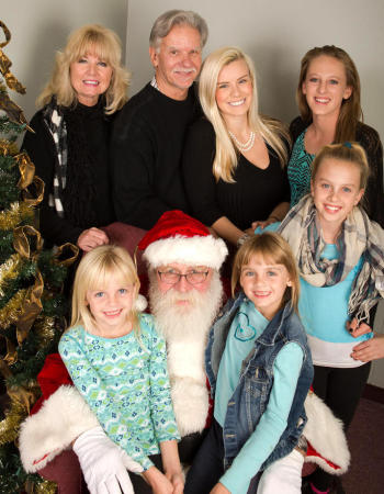 Cindi & I with our 5 granddaughters and Santa