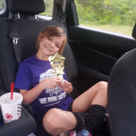 My daughter Aubree w/her volleyball trophy 😍