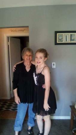 Me and granddaughter 8th grade formal. 