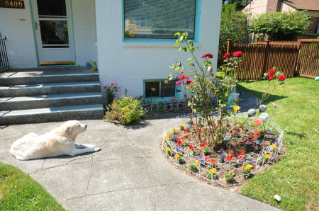 Chelsea admiring her garden another year past.