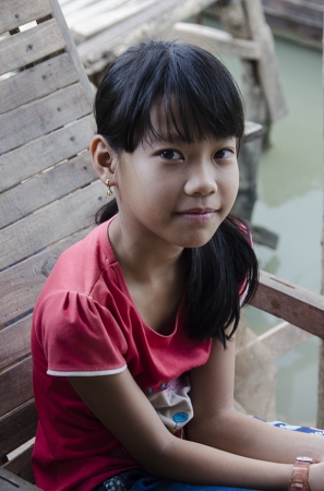 Young Vietnamese Girl In Boat Building Area