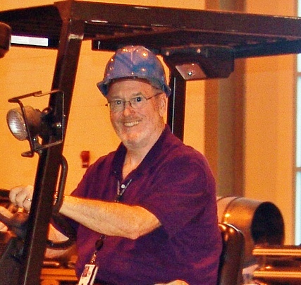 Jim Pritchert drive a forklift.