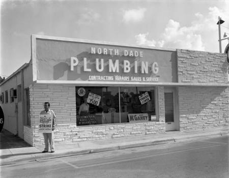 North Dade Plumbing by railroad tracks