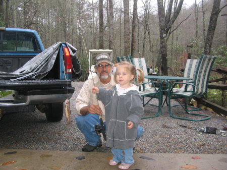 Summer with her first trout!