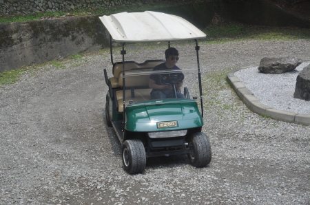 My son likes to race the golf cart...