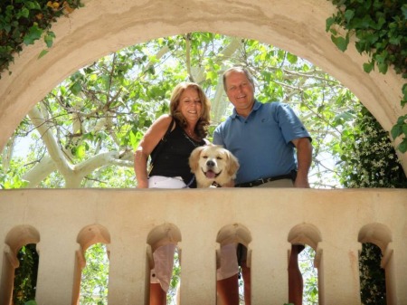 My wife Sandy and I with our golden, Kona.