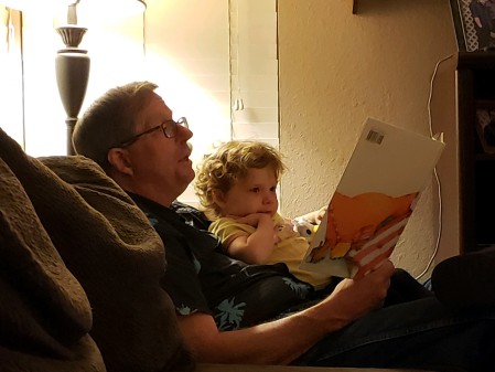 Story time with my granddaughter, Adilynn.