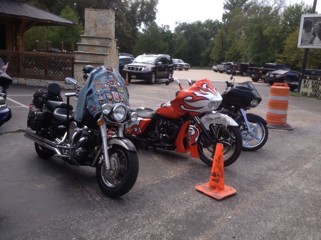 Gracie making friends with a custom Harley