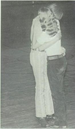 Wearing bell bottoms. 1970