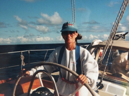 Me at the Helm of the 65' Sailboat Volcano