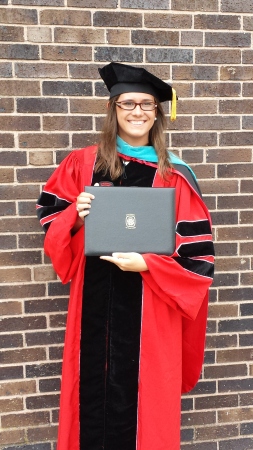 Graduation earning her Doctorate. Smart girl.