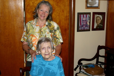 Judy and my mom. The photos in the background is my Dad. WW II  navy vet and the day he retired from Ford.