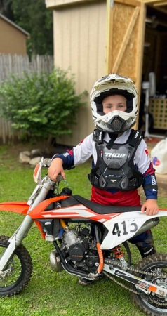 My grandson nolan. loves to race his dirt bike