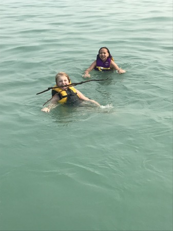 Savannah and Elsie swimming .