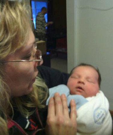 Me and my new (first) grandson; Alexander. He is four days old in this pic! 