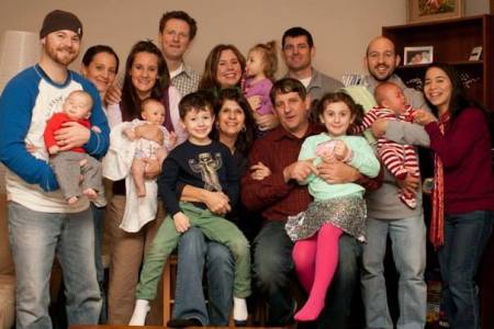 Our 4 children, their spouses,  grand babies