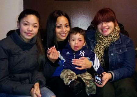 here is my daughter Doris,and her 2 beatiful daughter,and her hand some grand son