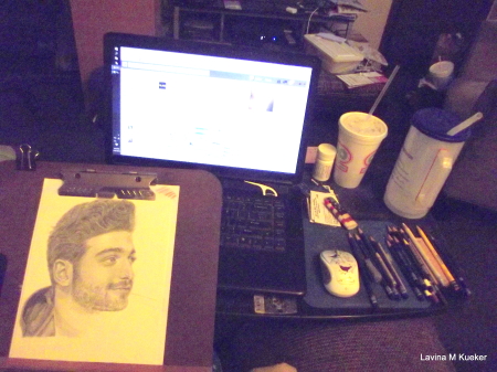 Messy desk in the middle of working.