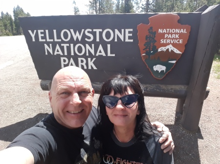 My Wife & me at the Gate into Yellowstone 2019