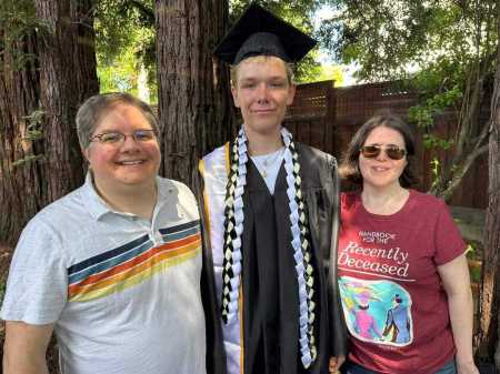 Ryan and his proud moms.